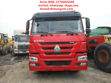 China Rojo 30 toneladas de camión de volquete transmisión manual del peso del vehículo de 13000 kilogramos proveedor